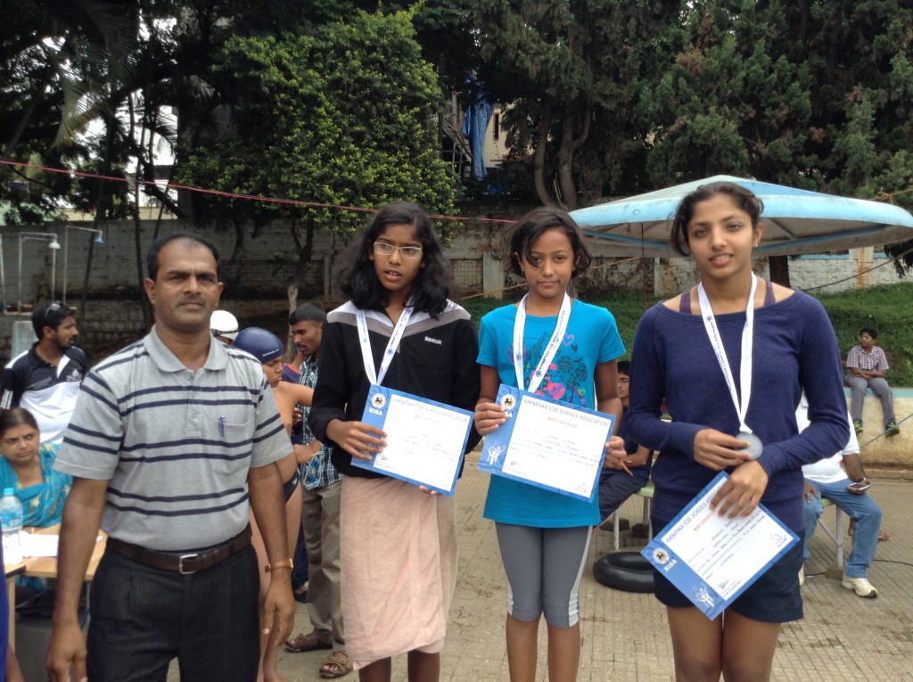 Star swimmer, Saloni Dalal (center) wins the Gold in 50 M Breaststroke